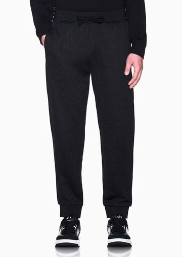Pantaloni a vestibilità regular in jersey jacquard stretch Neri