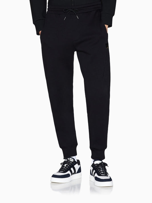 Pantaloni Uomo jogger in cotone felpato Nero